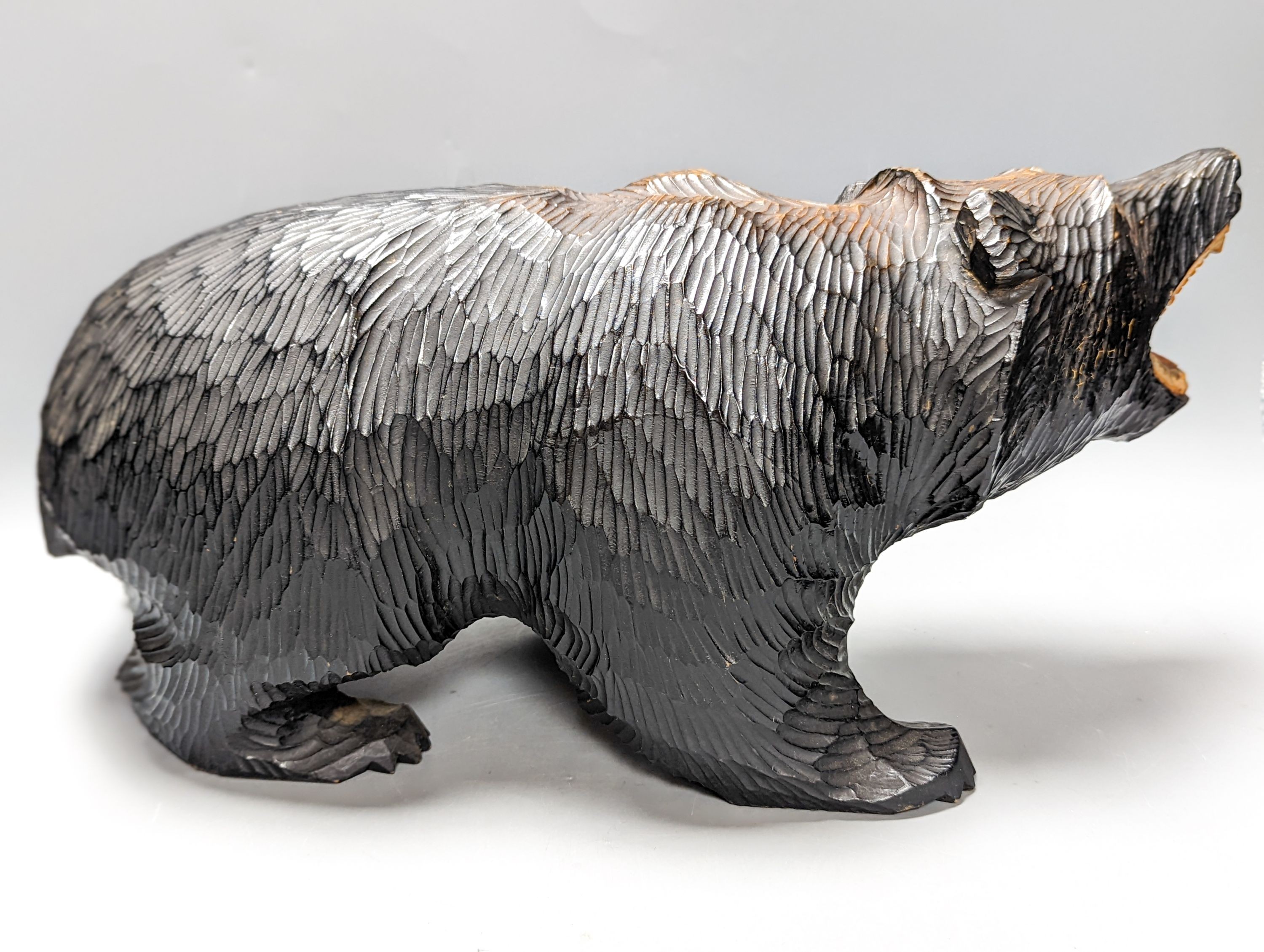 A Black Forest style carved bear 45cm